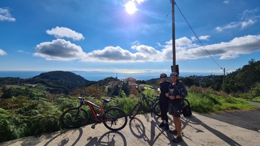 Camacha: Levada Trail e-Bike Guided Tour - Santo da Serra viewpoint: the climb on dirt, then oaks and shade