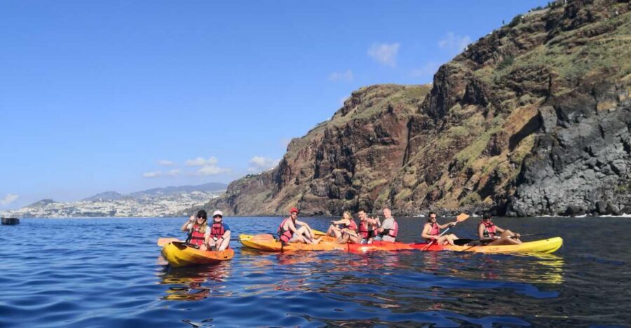 Caniço, Madeira: Marine Reserve Kayak & Snorkelling Tour - Kayak time under the cliffs: a calmer sport than it sounds